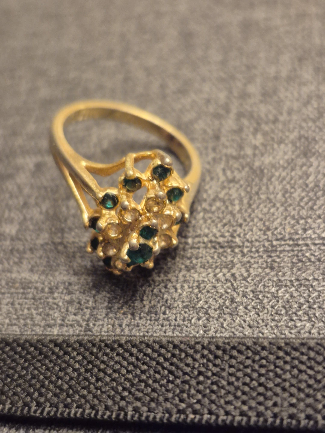 Gold-tone cluster ring with green and clear stones
