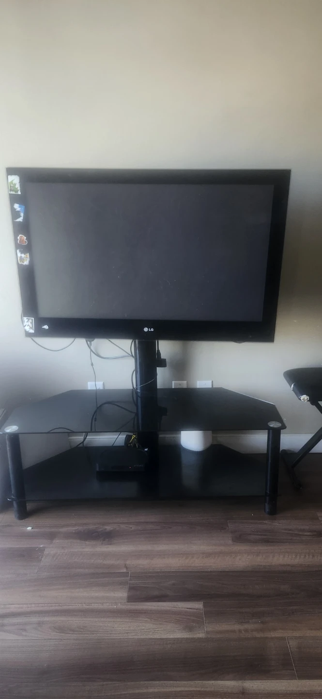 Black Glass TV Stand for sale and the TV is free! - photo 2