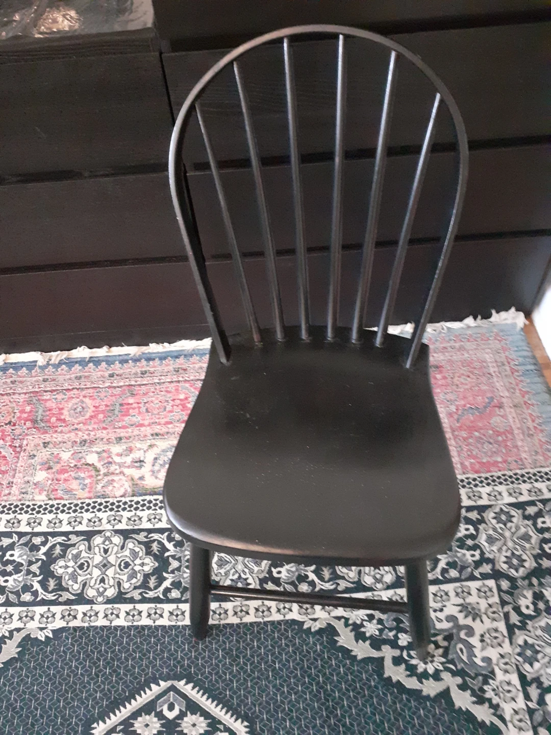 Black Windsor style wooden chair