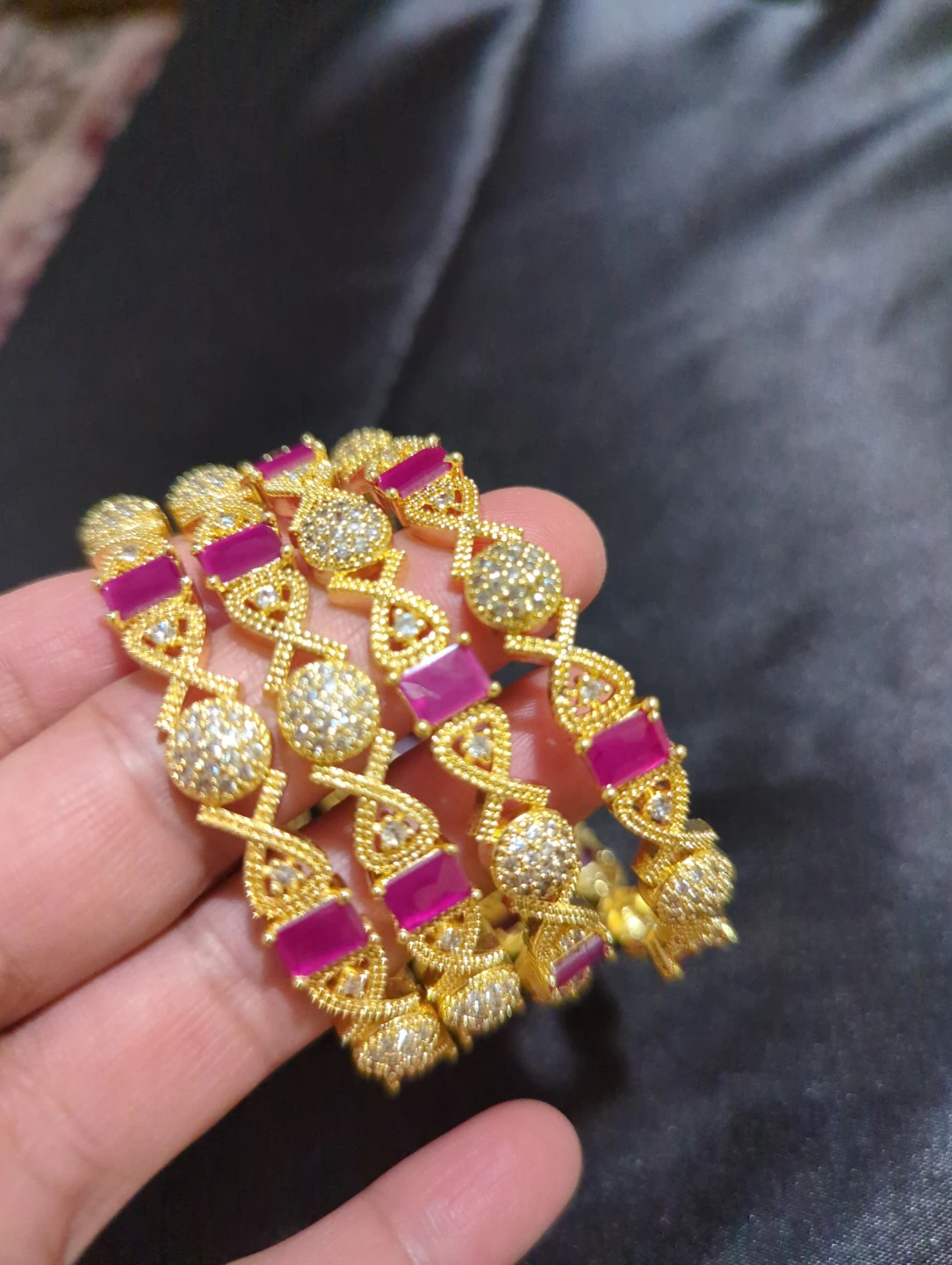 Gold-tone Bangles with Pink Stones
