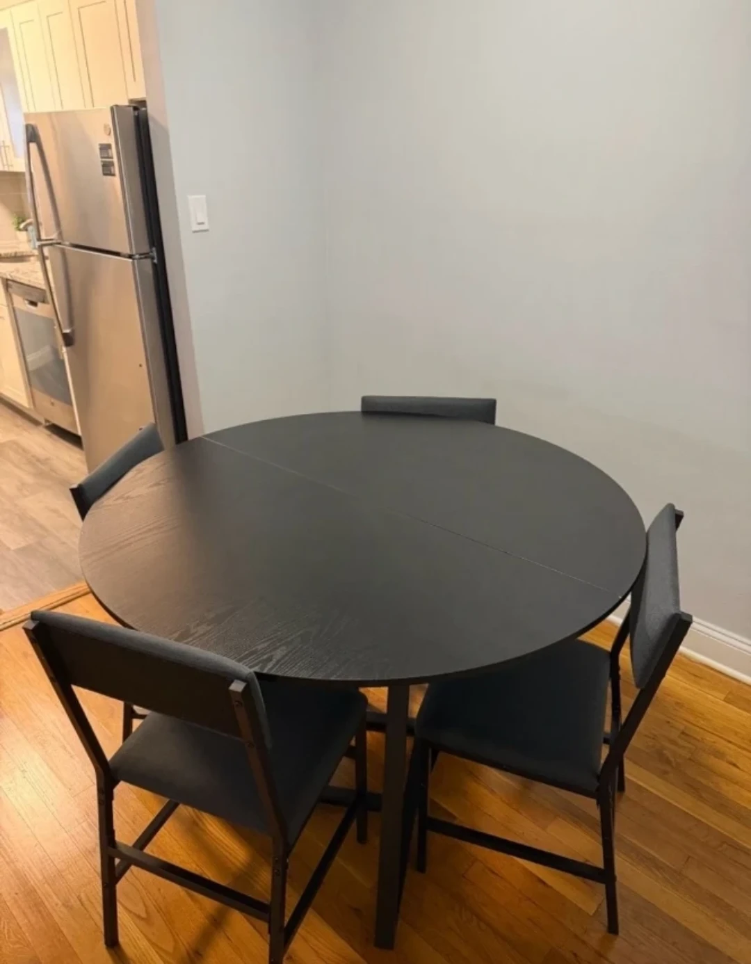 Almost brand new Black Round Dining Table and 4 Chairs Set - photo 2