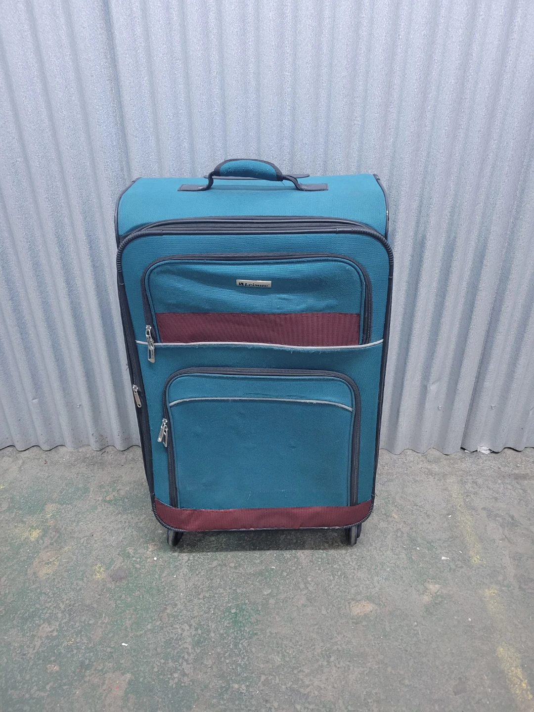 Leisure Teal Rolling Suitcase