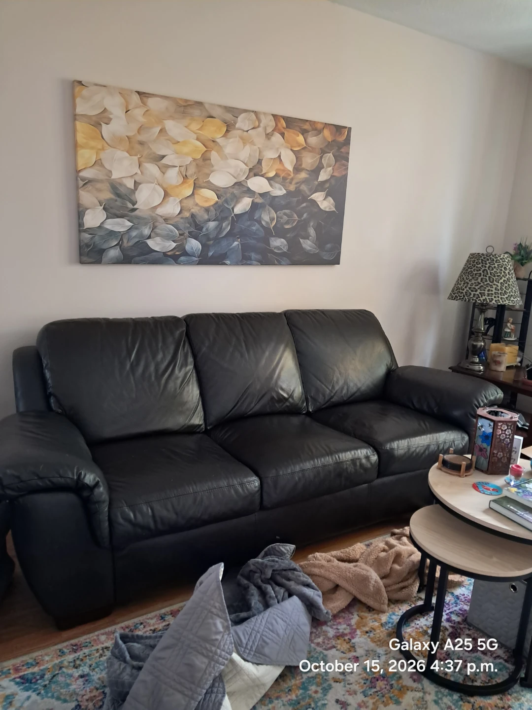 Black Leather Three-Seater Sofa