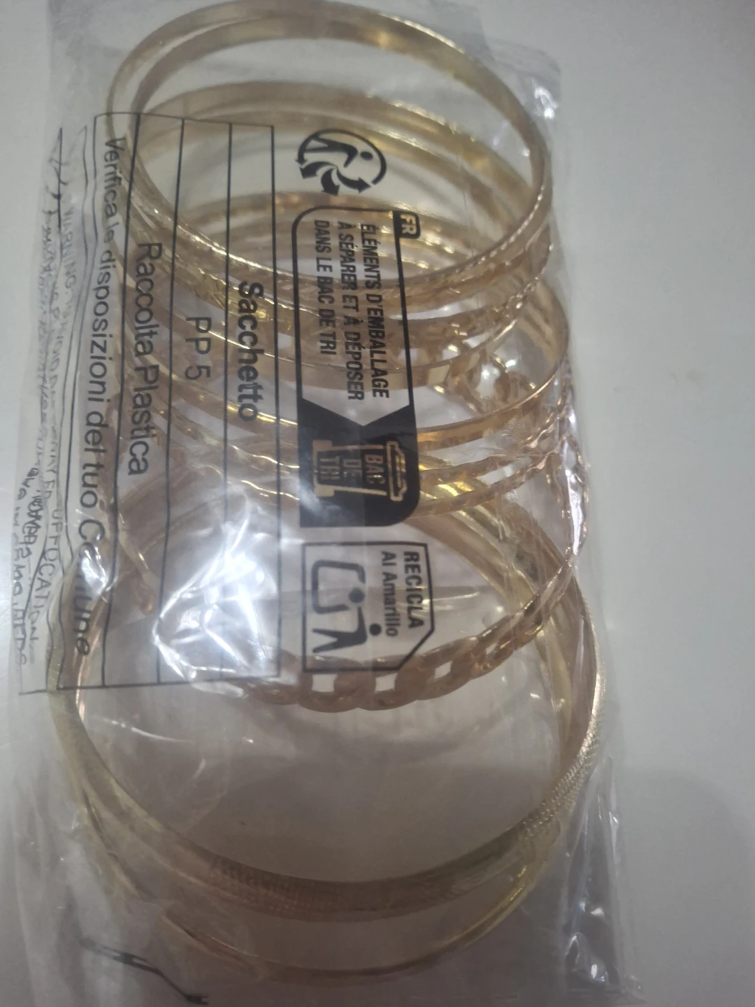 Set of 9 Gold-Tone Metal Bangles - photo 5
