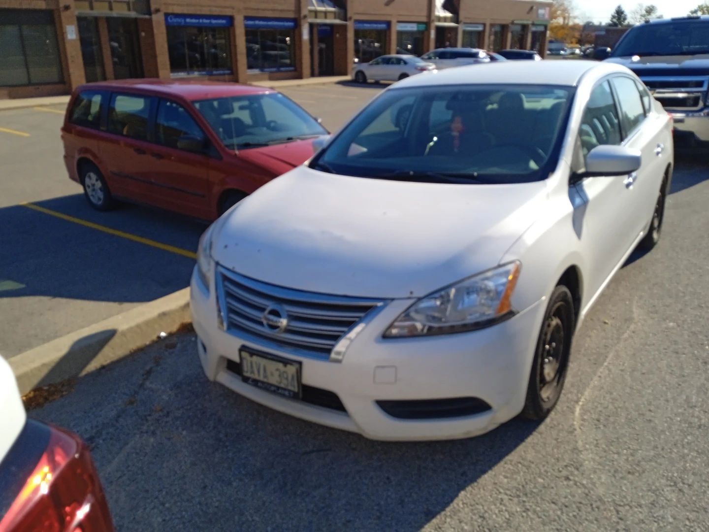White Nissan Sentra sedan (contact) - photo 2