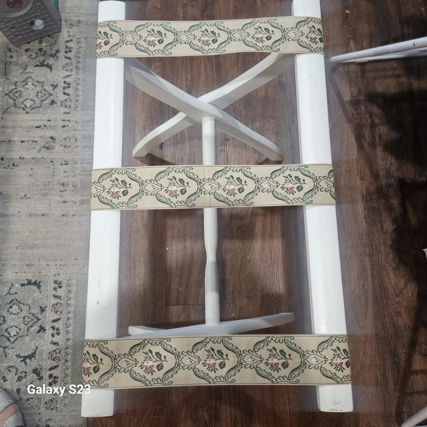 White Luggage Rack with Floral Straps