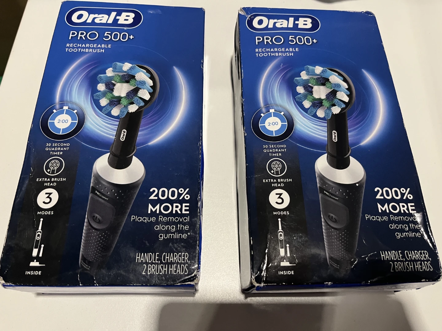 Two Oral-B Pro 500+ Rechargeable Toothbrushes