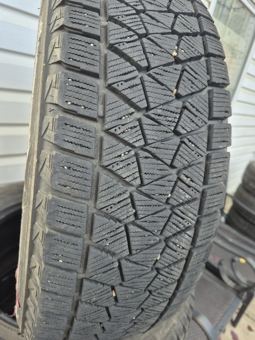 Two Bridgestone 225/65R17 102S Winter Tires - photo 3