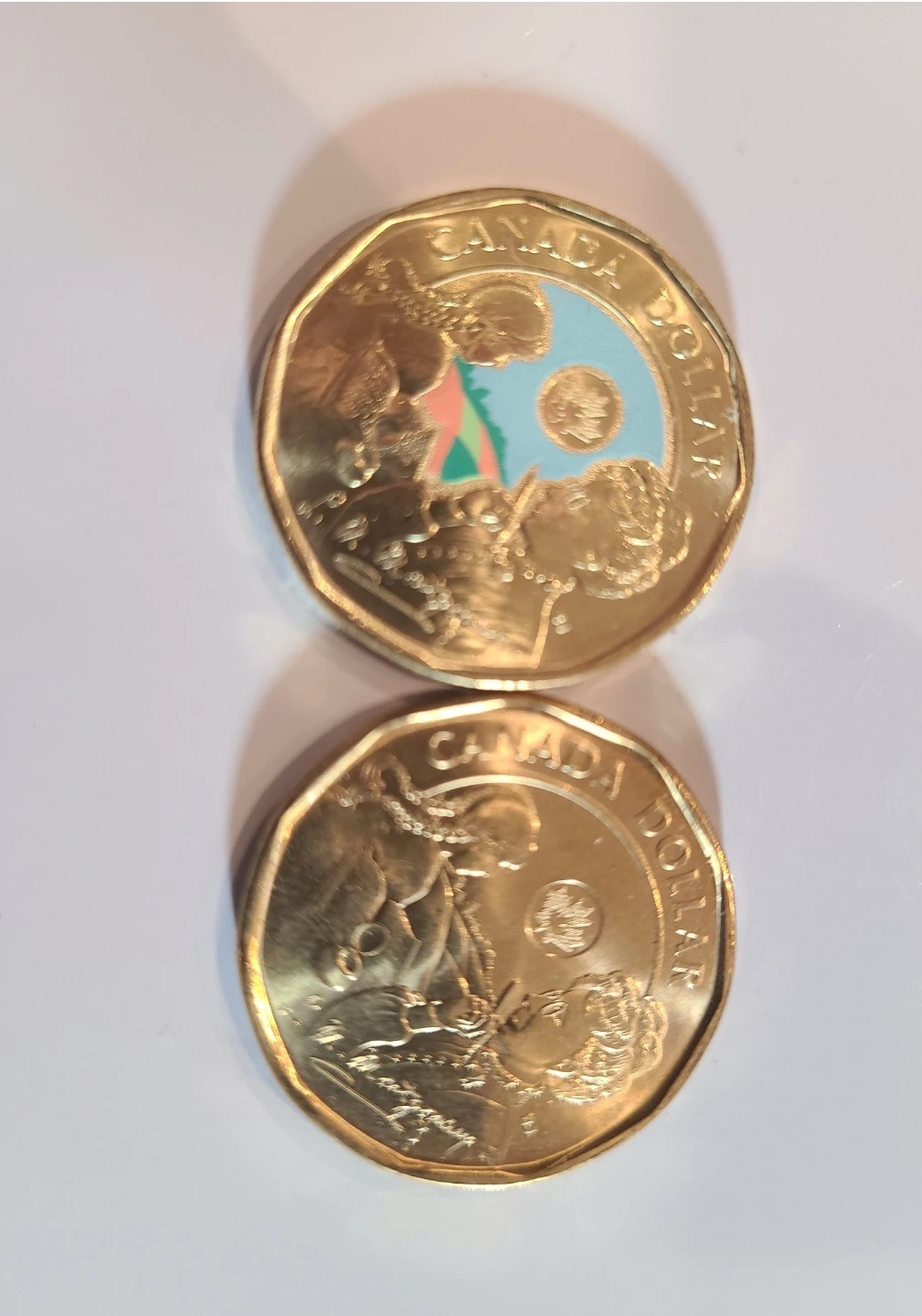 Coloured and non coloured One Dollar Coins