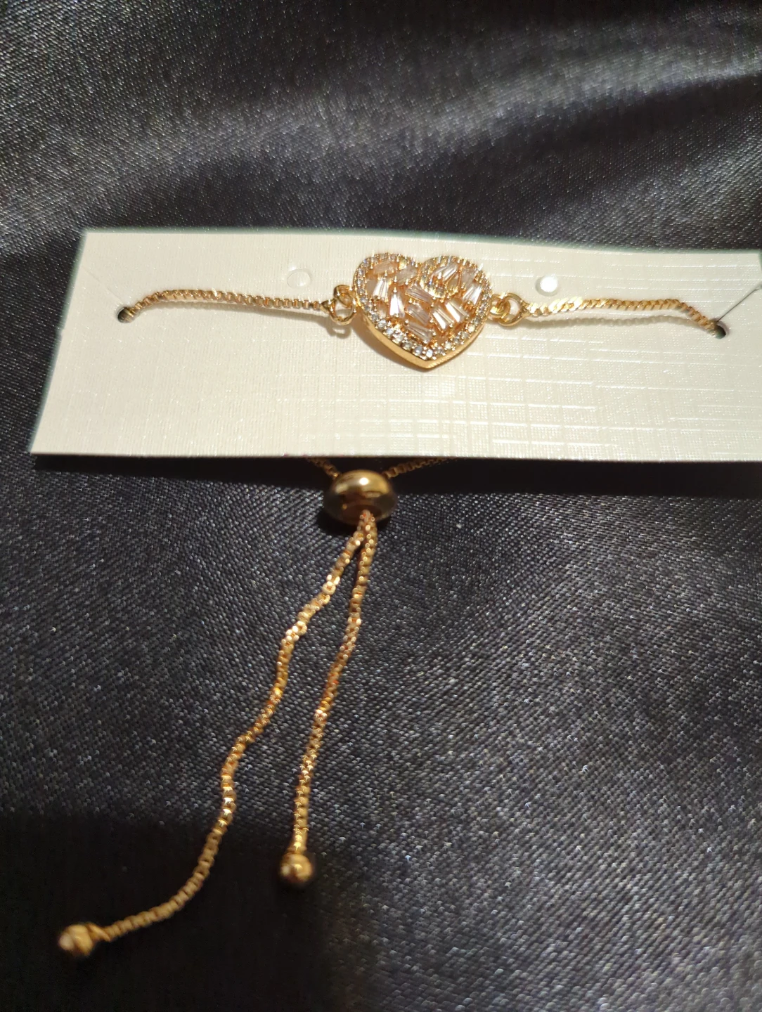 Gold-Tone Heart Bracelet with Baguette Stones