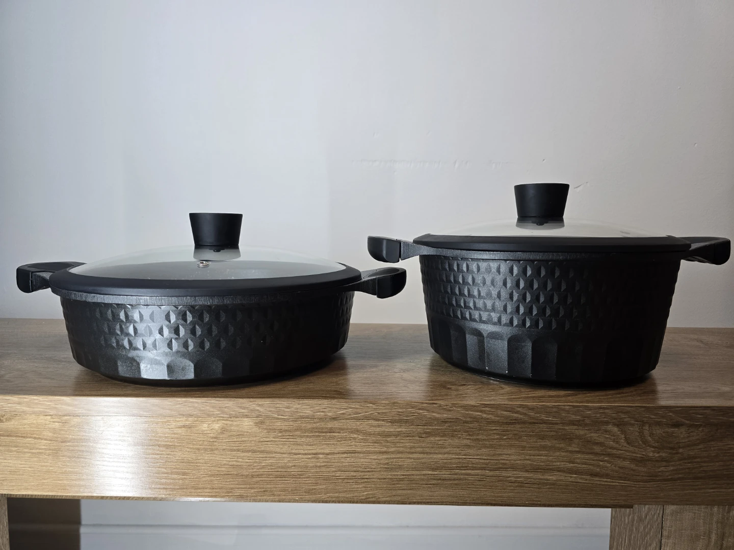 Two Black Speckled Non-Stick Pots with Lids