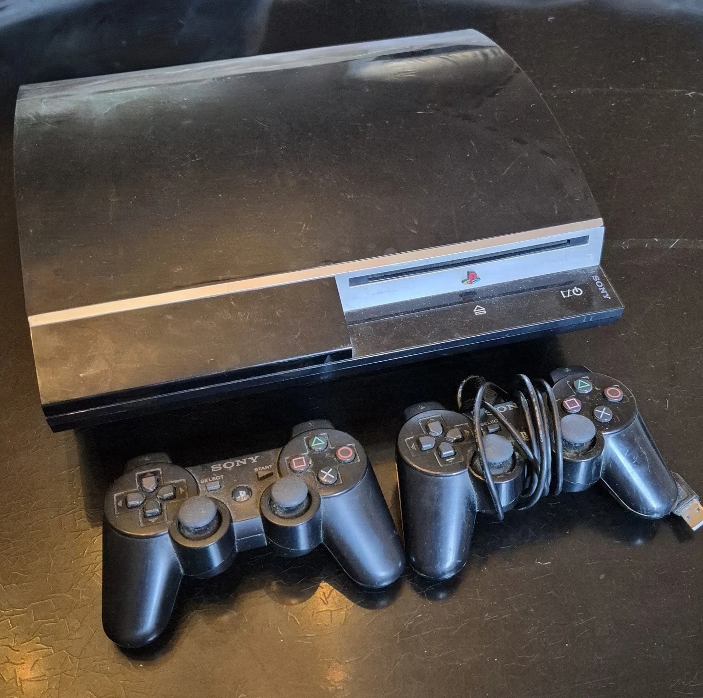Sony PlayStation 3 Console with Two Controllers