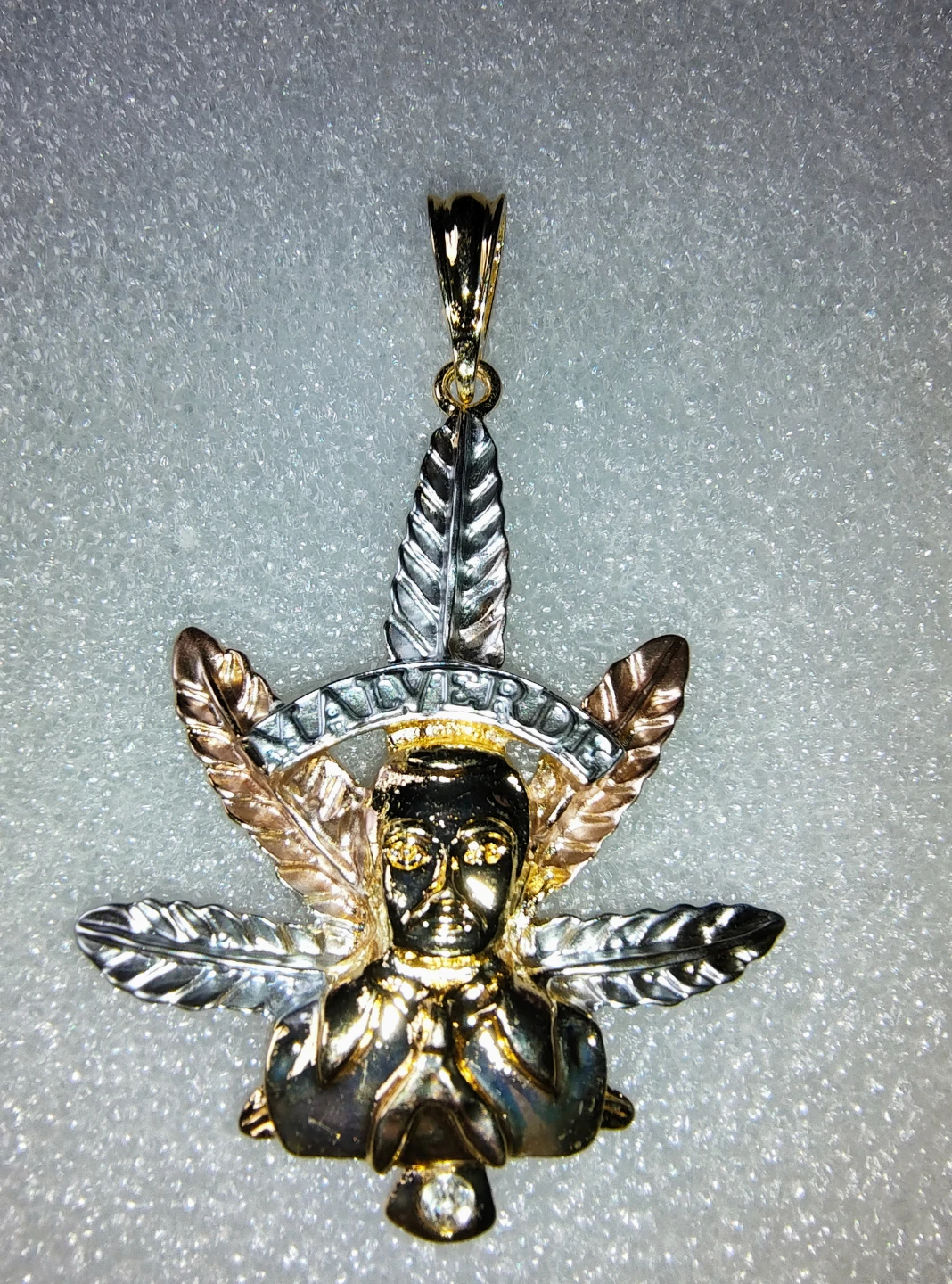 Tri-color gold plated  mal verde and marijuana leaf pendant.