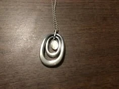 SAQ Silver Tone Necklace with Mother of Pearl Pendant