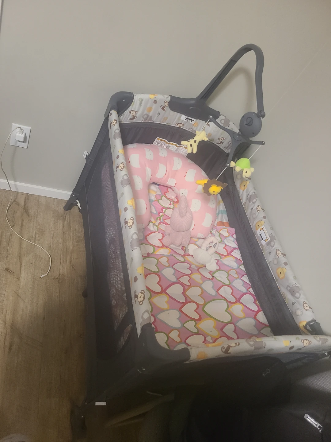 Graco Pack 'n Play Playard with nursing pillow.