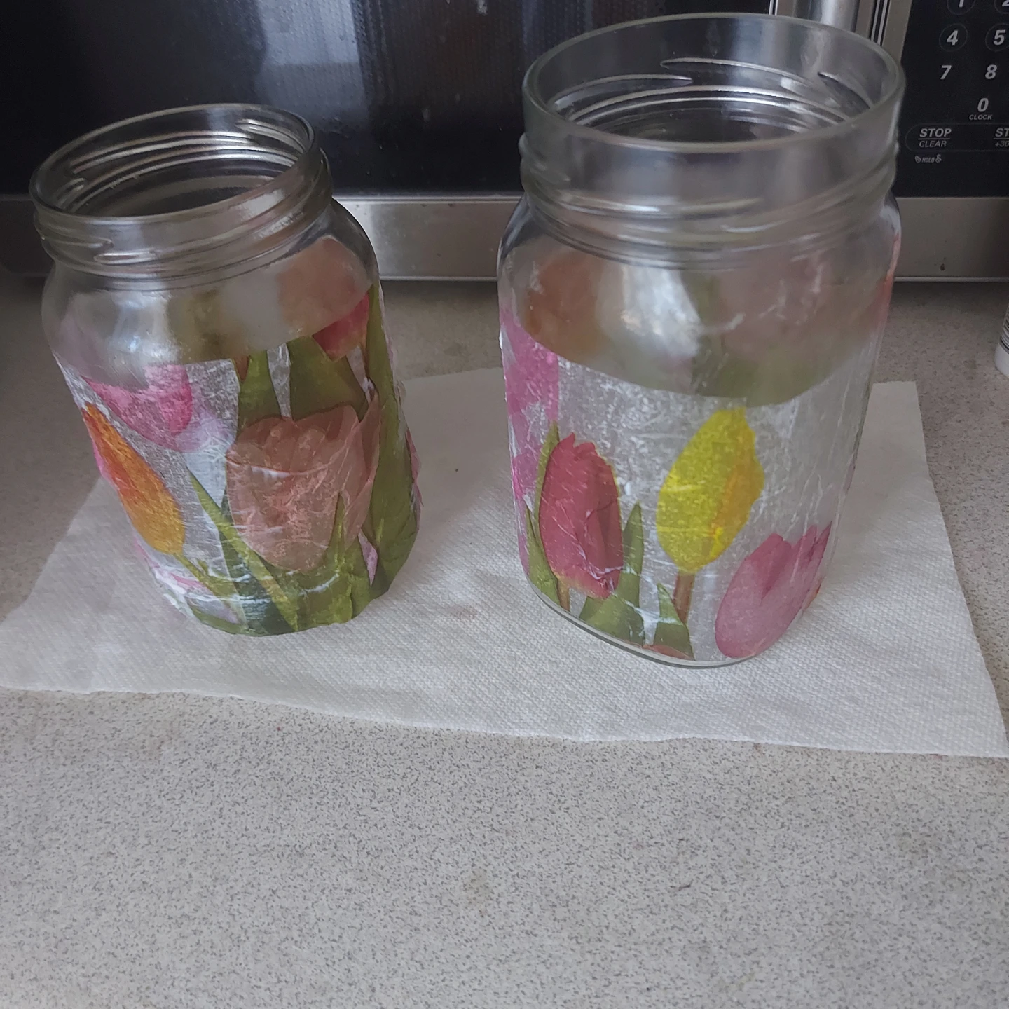Two Decorative Glass Jars with Tulip Design