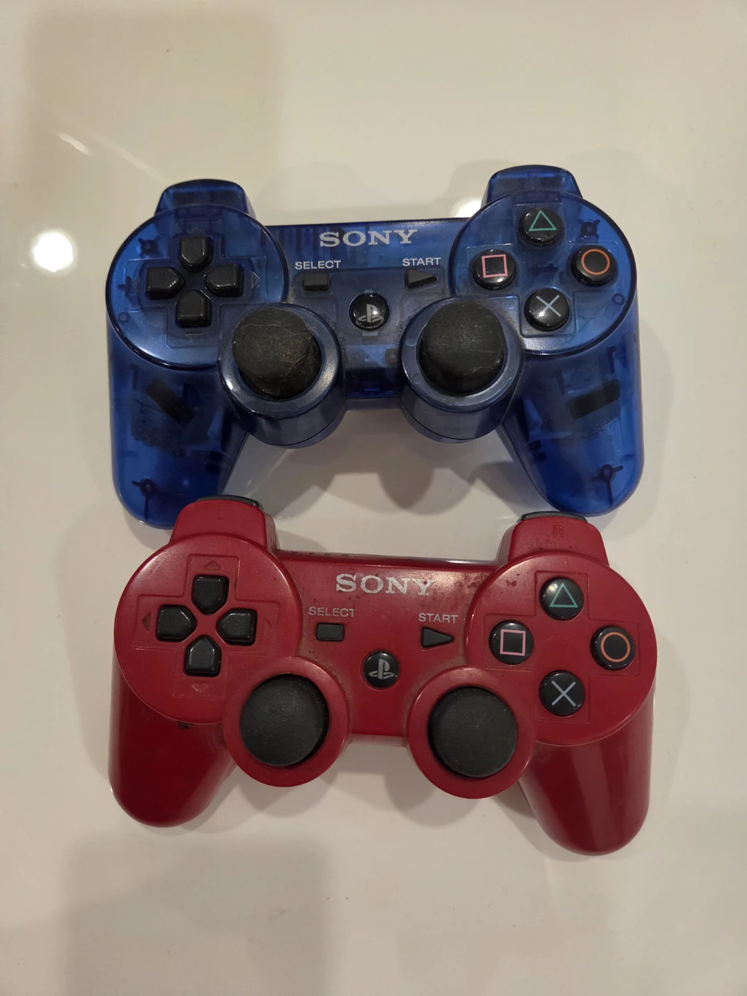 Two Sony PS3 DualShock 3 Wireless Controllers