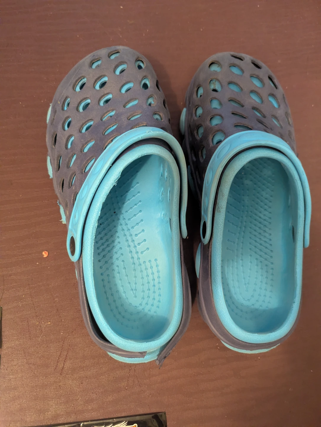 Blue and grey clogs