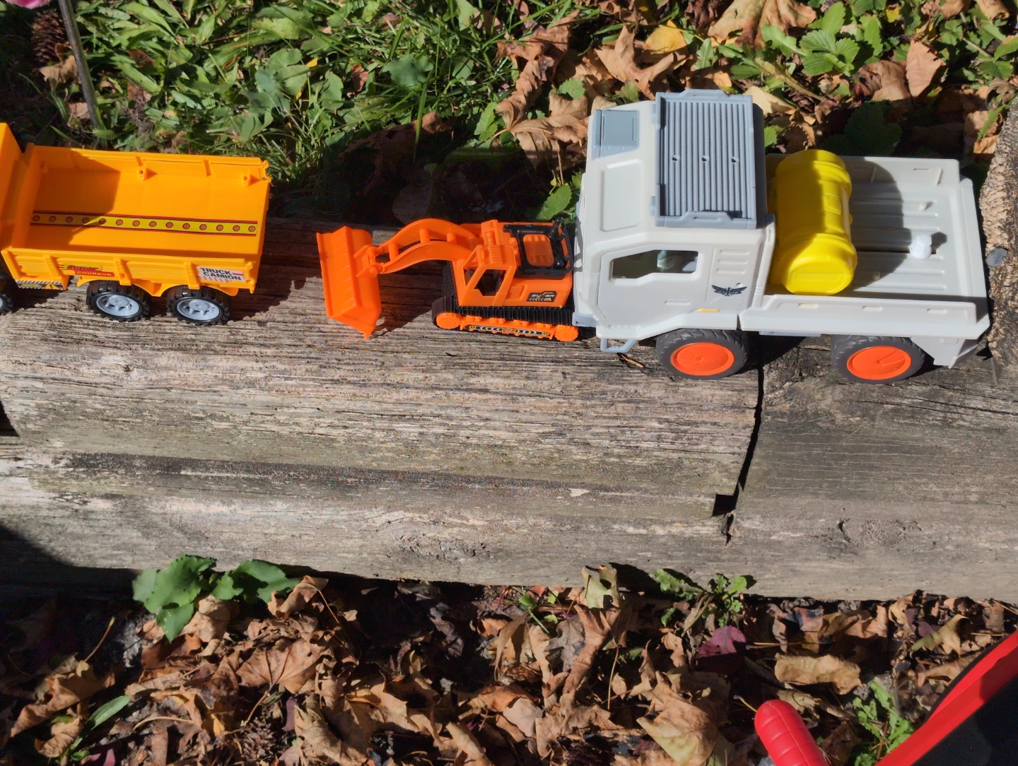Assorted Toy Trucks and Construction Vehicles
