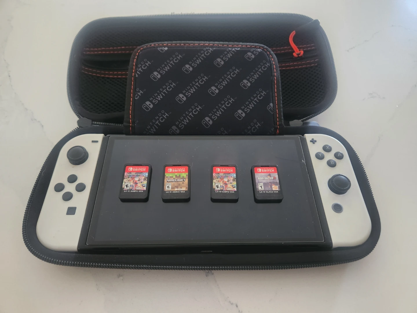 Nintendo Switch OLED Model White with 4 Games and Case