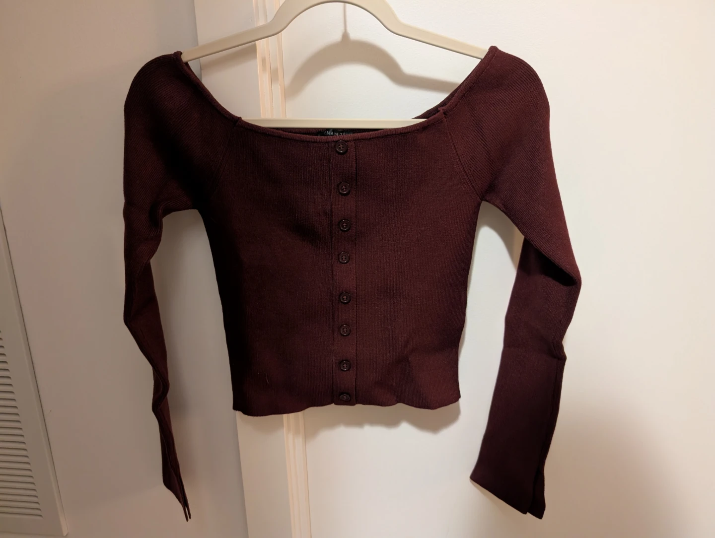 Off-shoulder cropped burgundy sweater