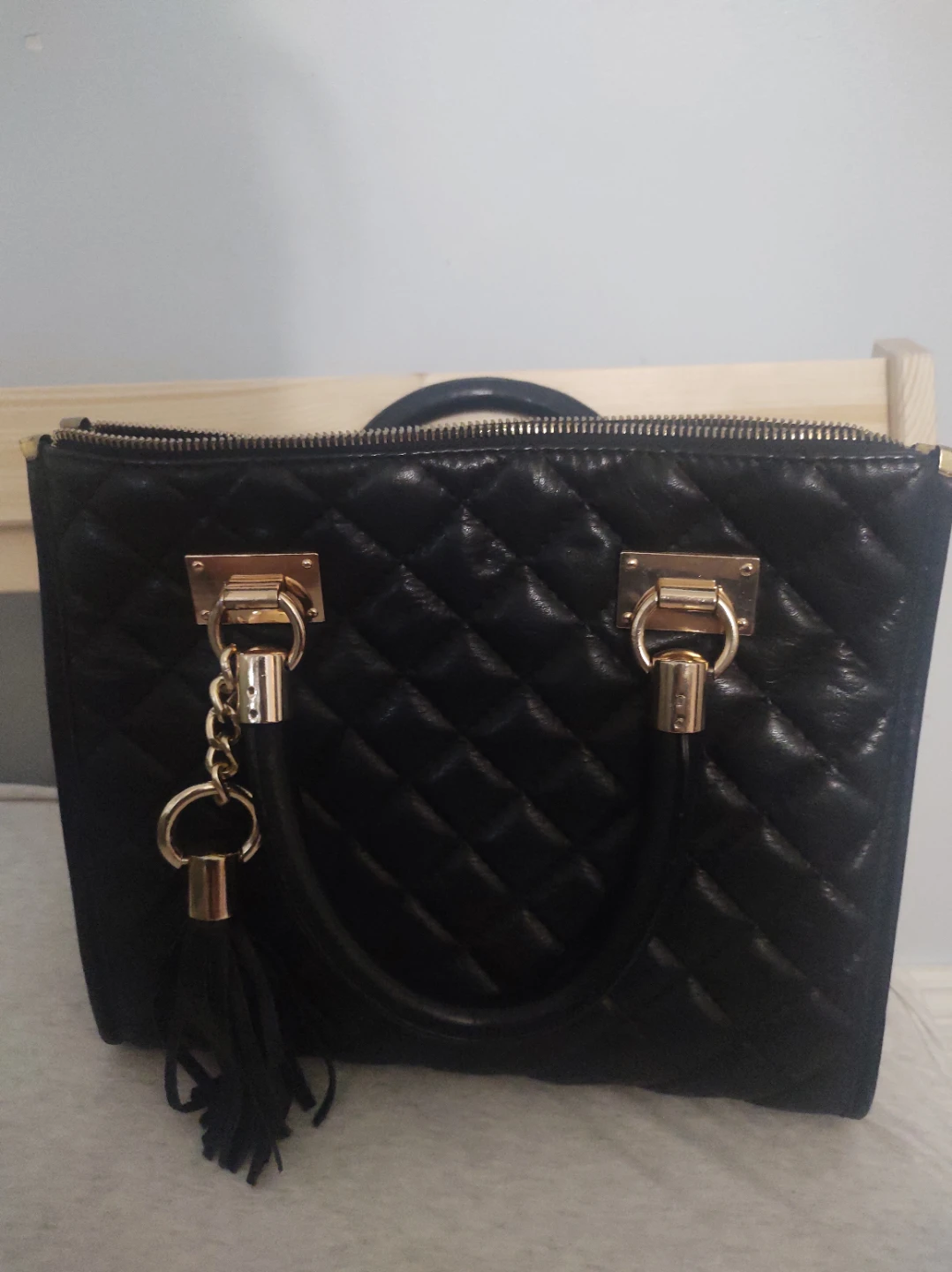 Black Quilted Handbag with Tassel