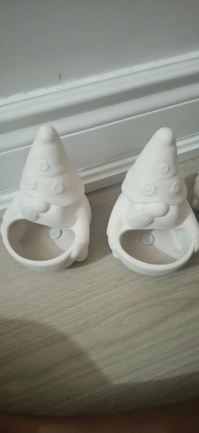 Ceramic Garden Gnome Planters.$3 each