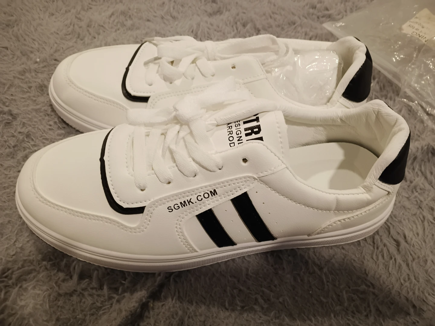 New White Sneakers with Black Accents