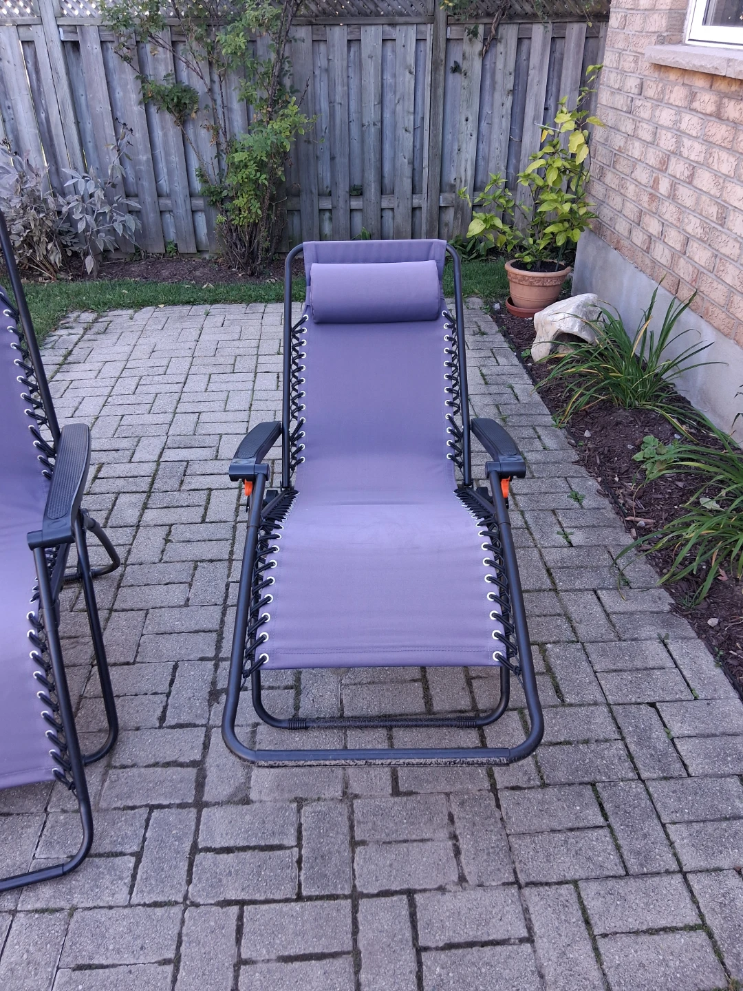 Two blue Zero Gravity Recliner Chairs