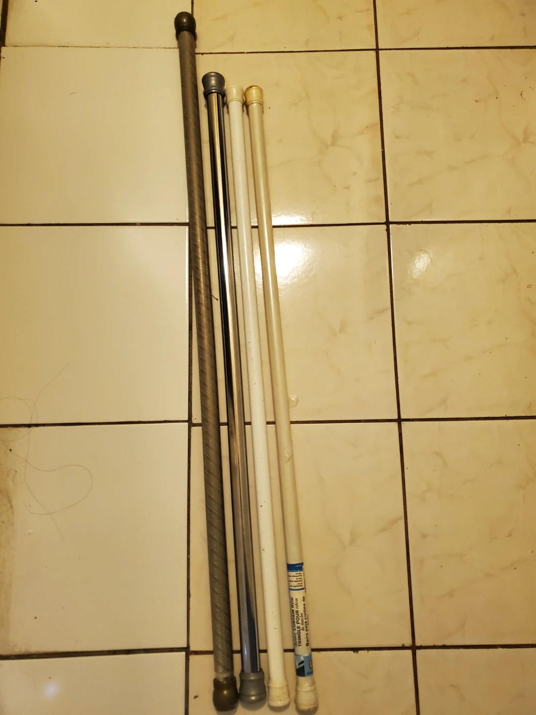 Four Assorted Shower Curtain Rods