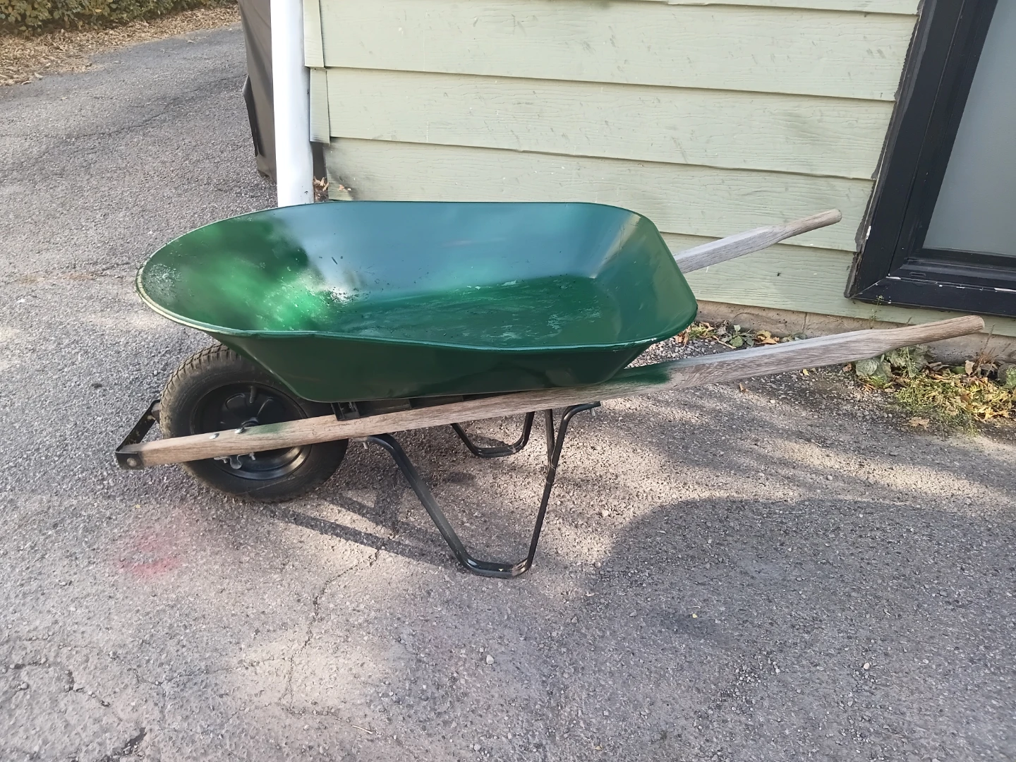 Compact Green Metal Wheelbarrow