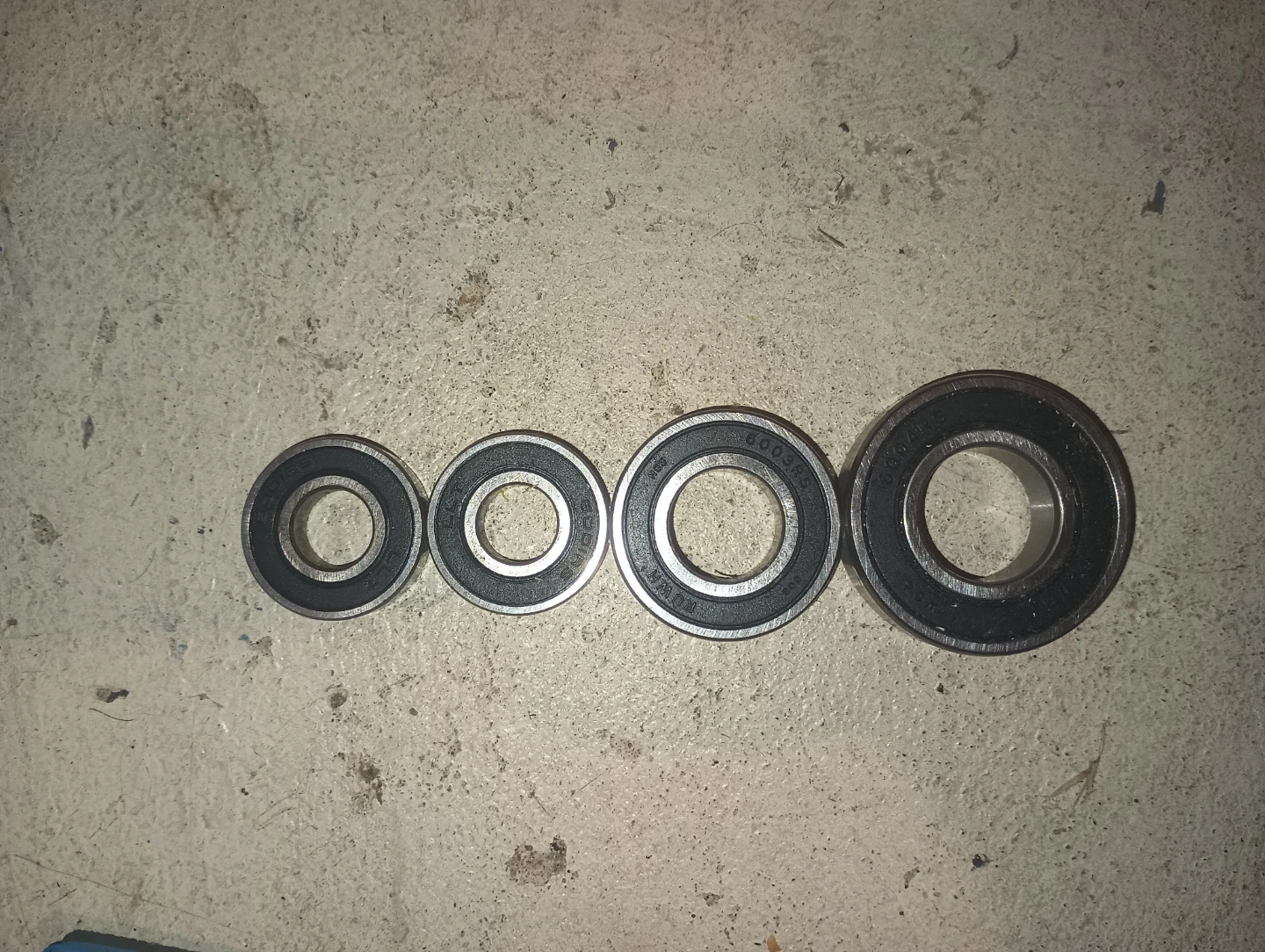 Four Metal Ball Bearings