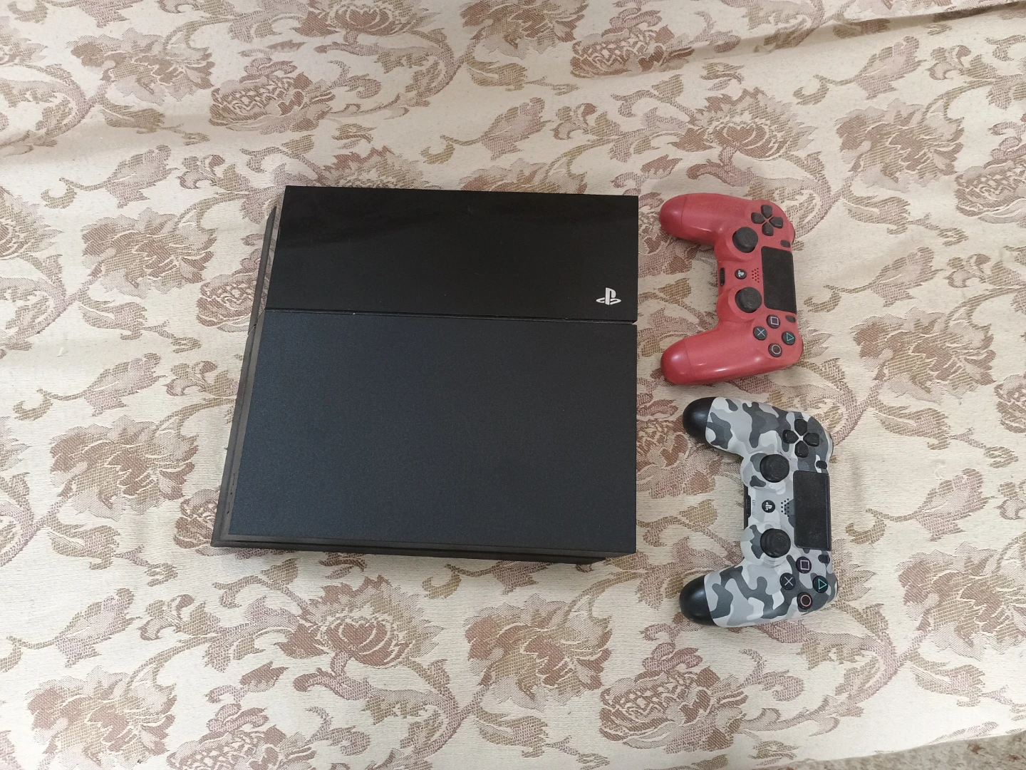 PlayStation 4 with 2 controllers