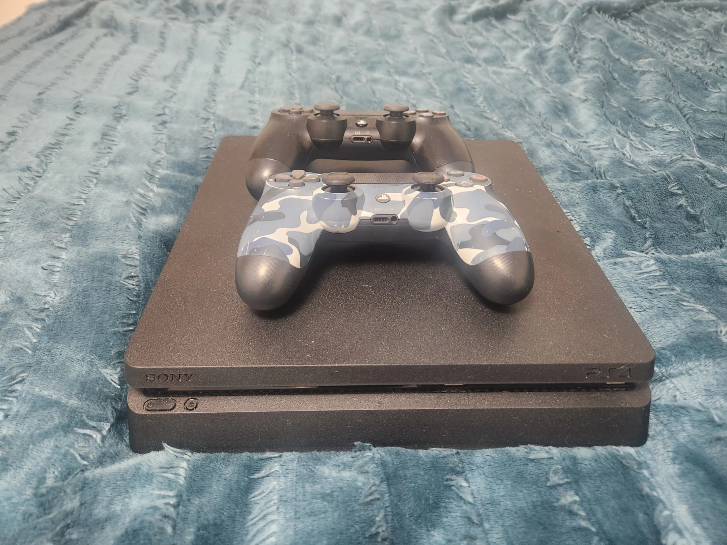 Sony PlayStation 4 Slim Console with 2 Controllers