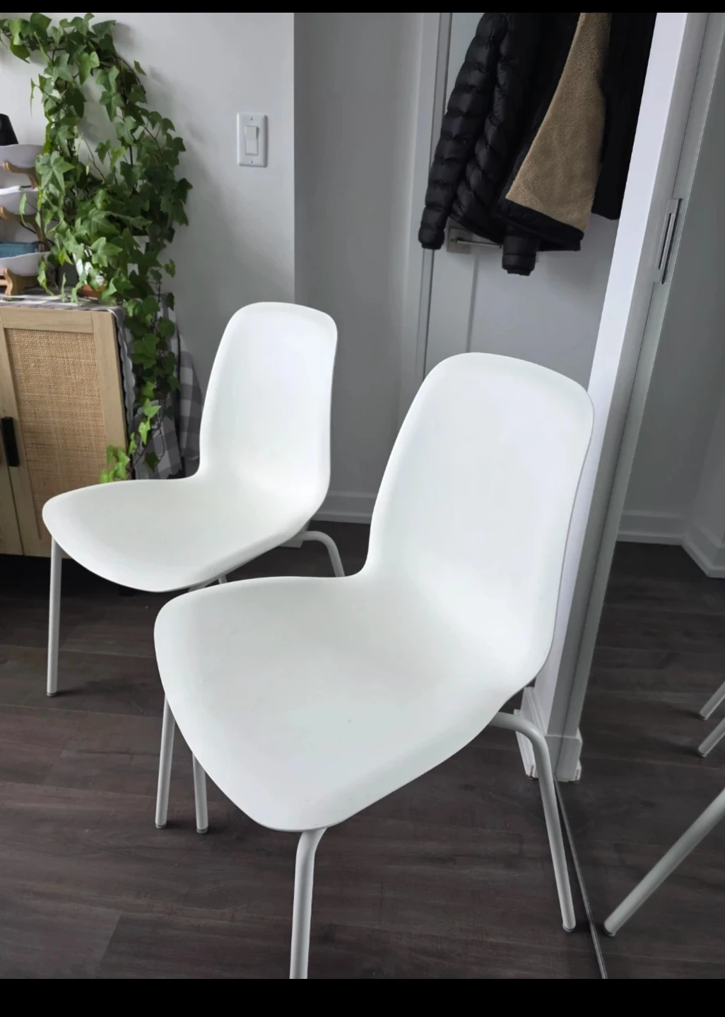 Two White Eames Style Dining Chairs
