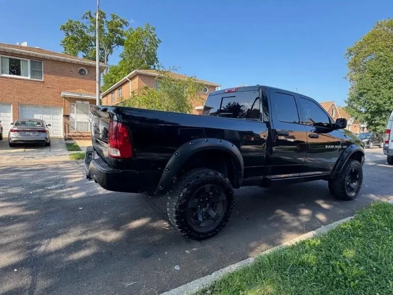 2012 RAM 1500 4 DOOR SLT HEMI AWD - photo 4