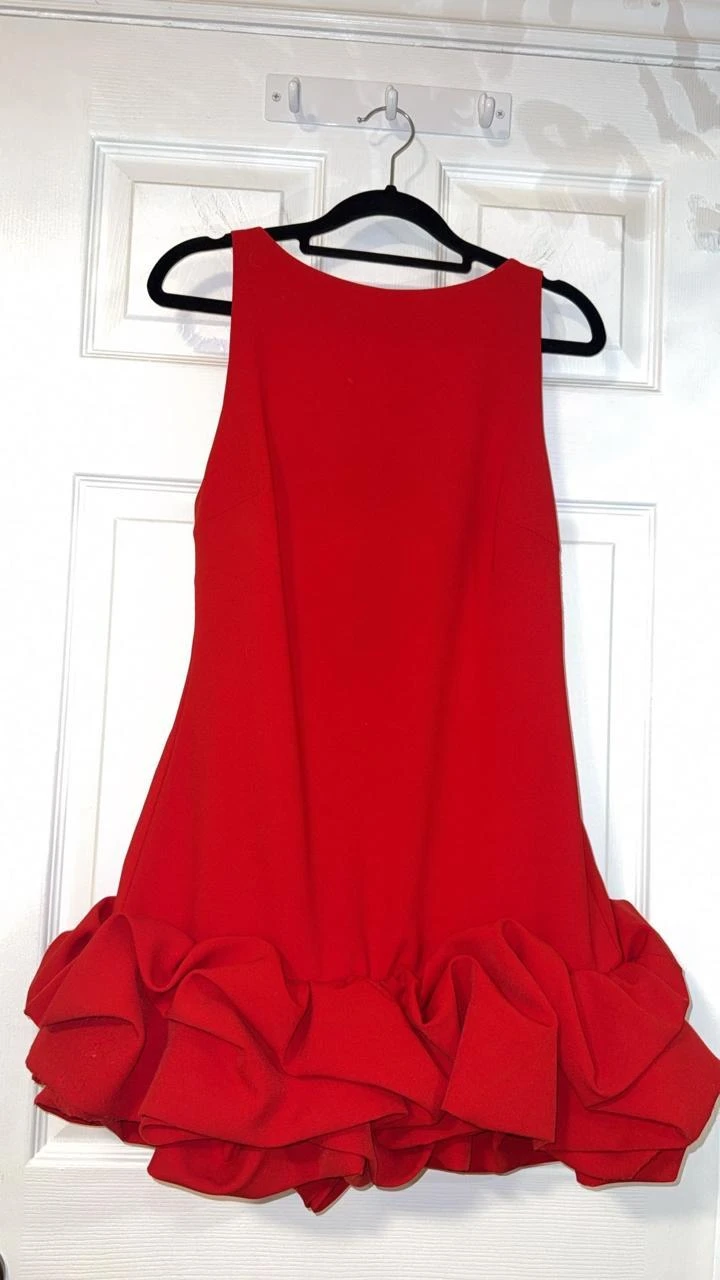 Red sleeveless ruffle hem dress
