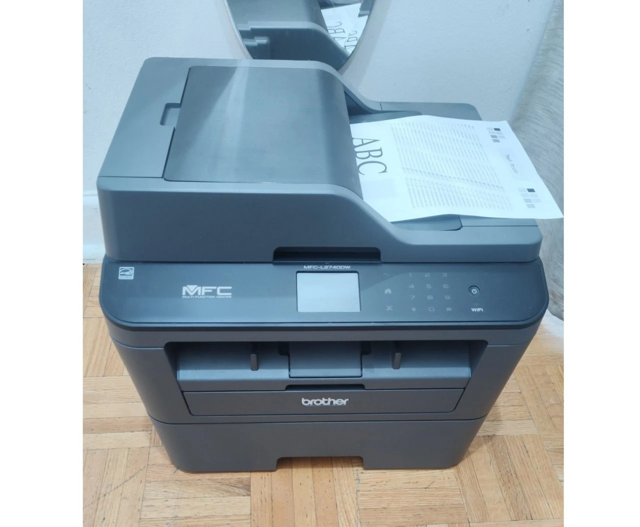 Brother MFC-L2740DW Wireless Laser Printer (75% Toner Included)