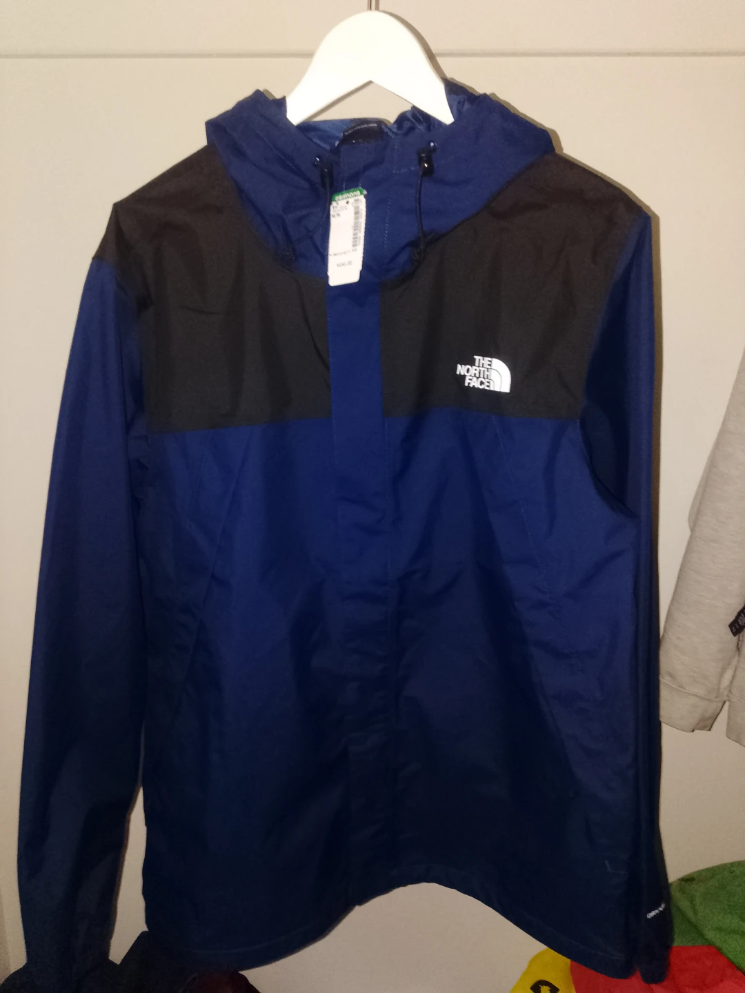 The North Face Blue and Black Rain Jacket