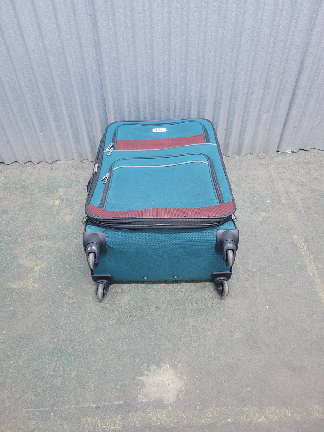 Leisure Teal Rolling Suitcase - photo 3