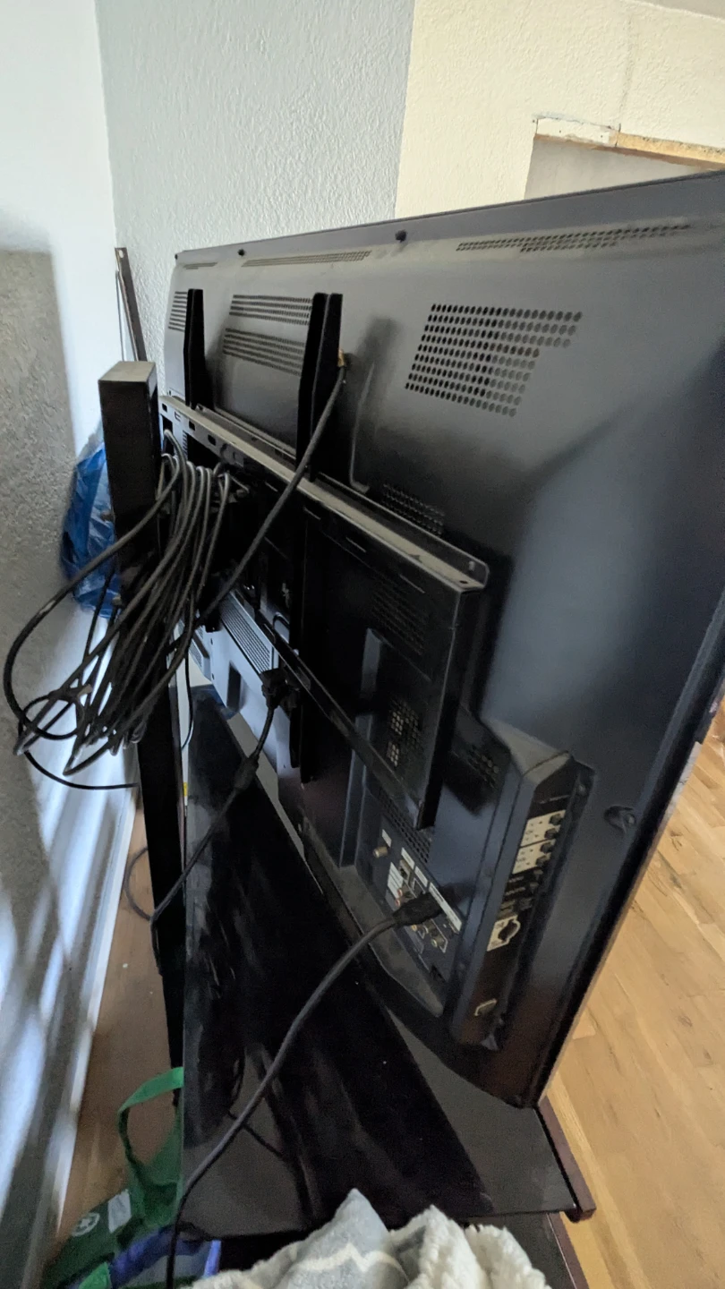 Panasonic television with 3-tier glass and wood stand - photo 4