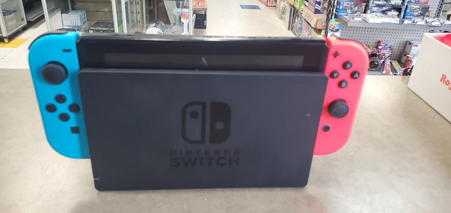 Nintendo Switch Console with Neon Controllers