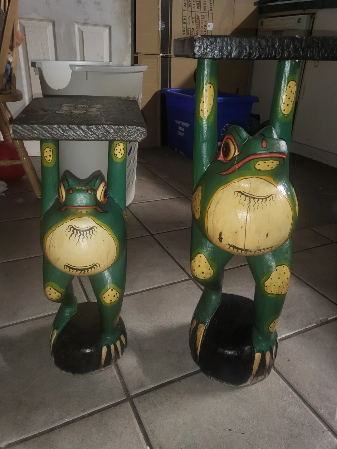 Set of two hand-carved frog end tables