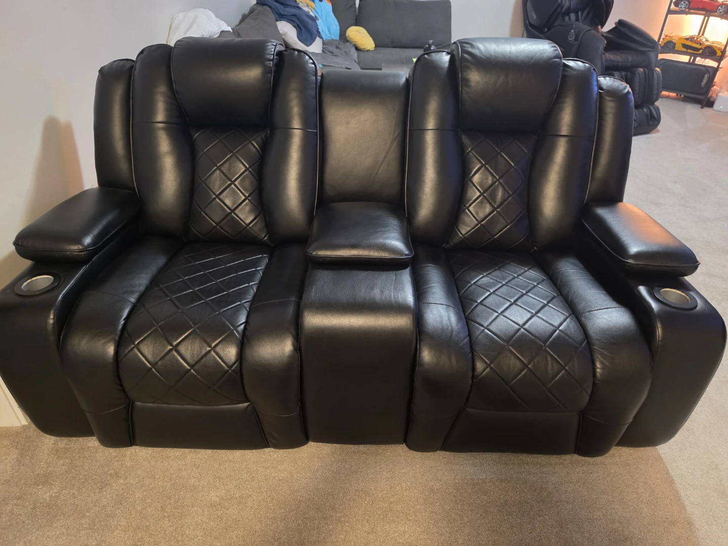 Black Leather Reclining Loveseat with 3 Consoles