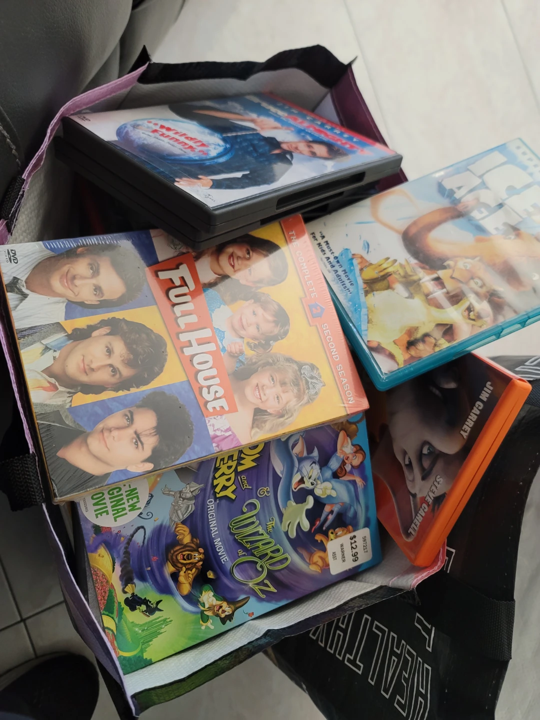 Collection of 60 Assorted DVDs