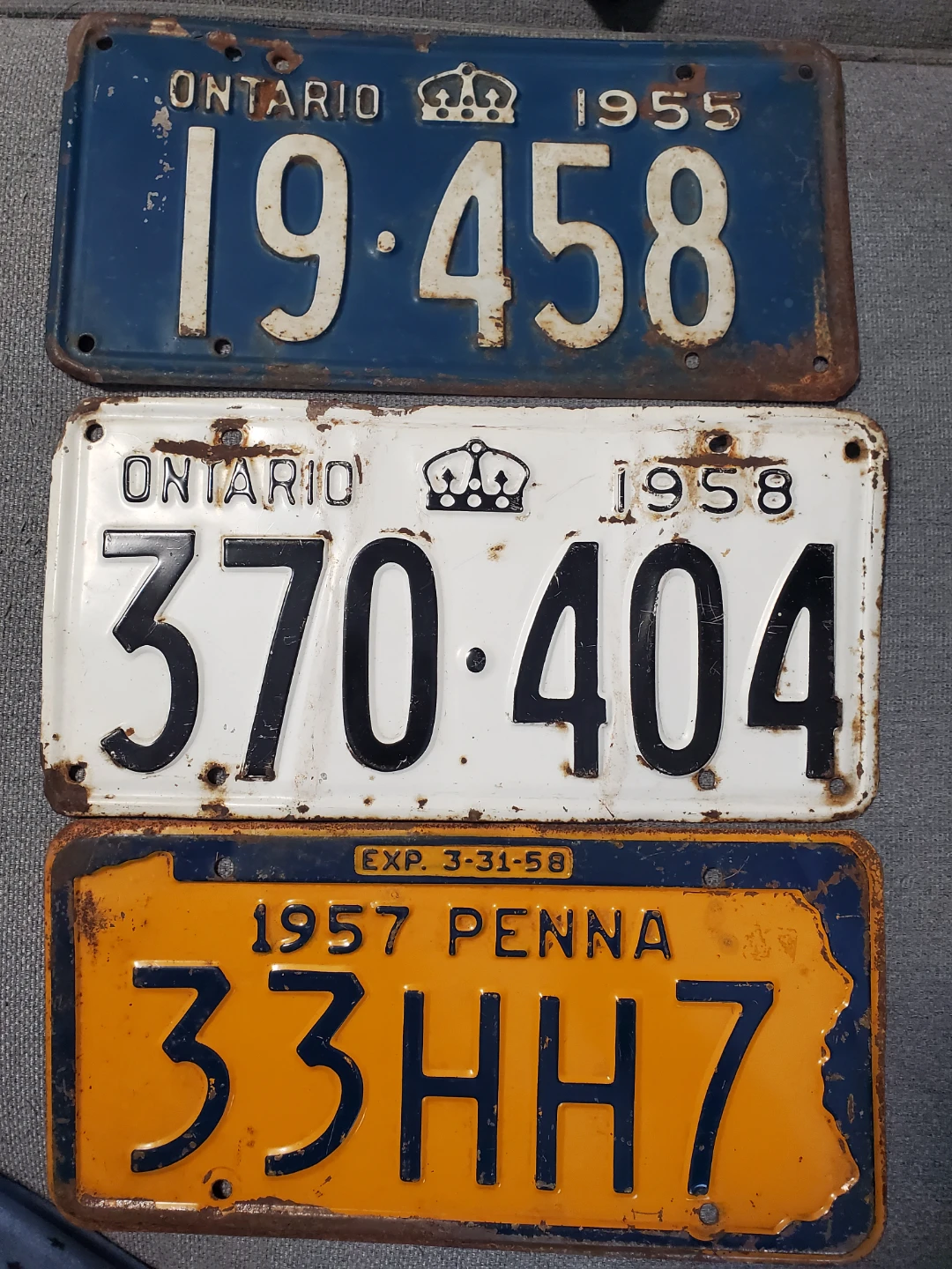 3 vintage License plates