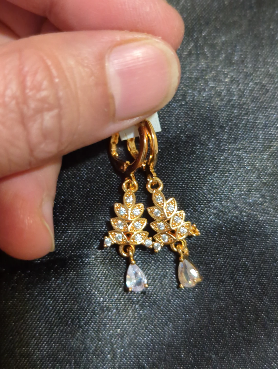 Gold-tone leaf dangle earrings with drop stones - photo 2