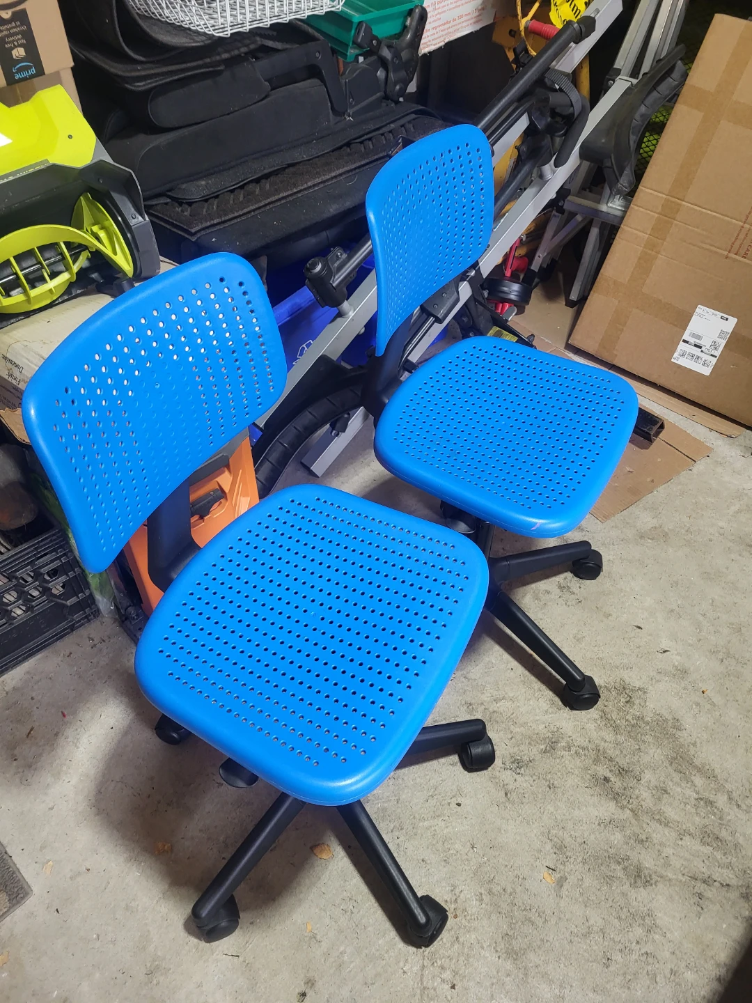 Two Blue Adjustable Rolling Task Chairs