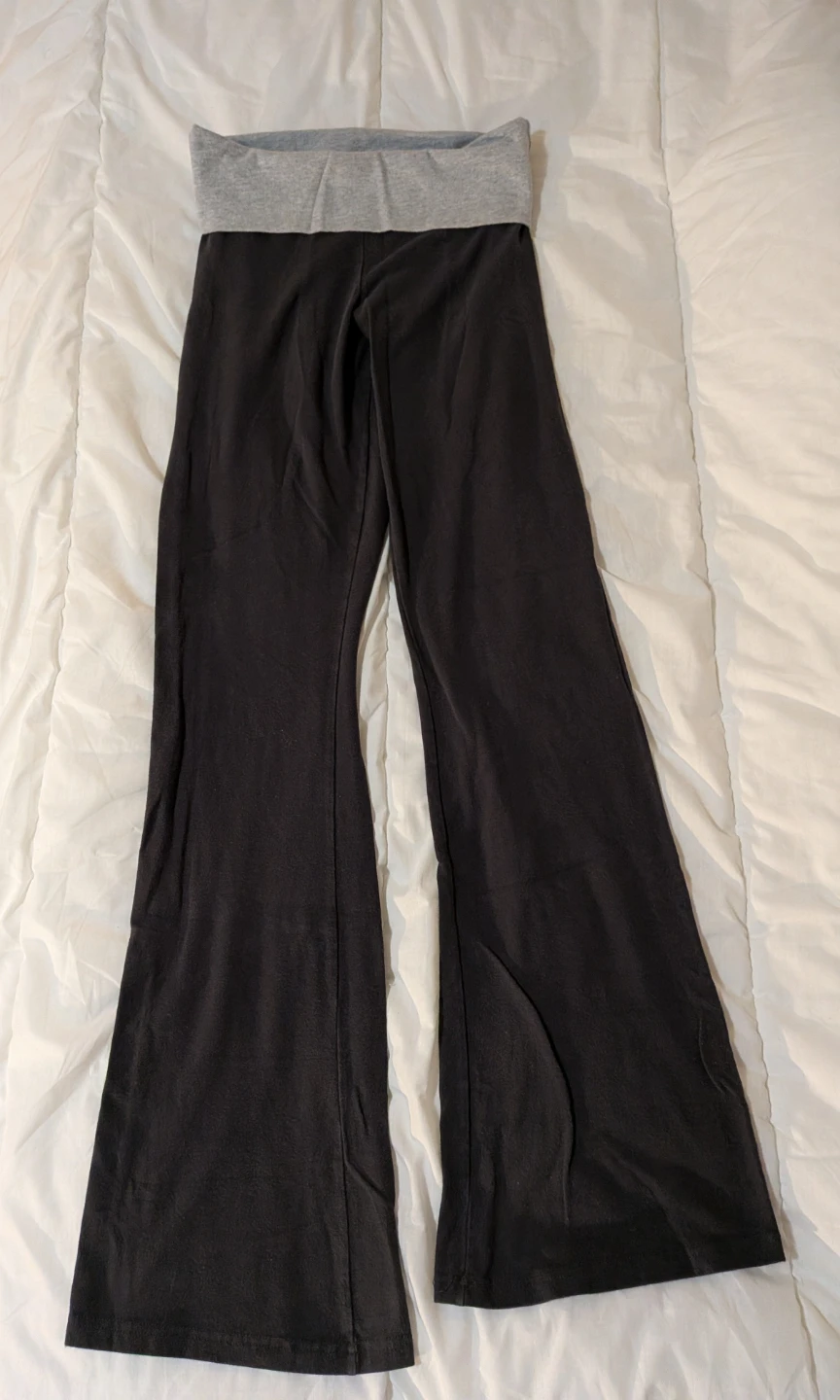 Black flare yoga pants with grey fold-over waistband