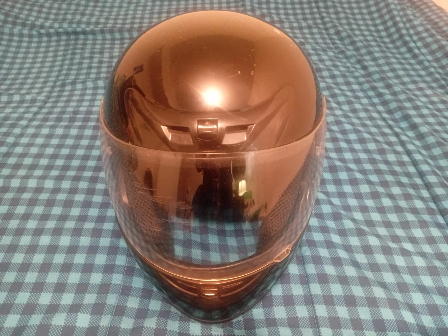 Black full-face motorcycle helmet